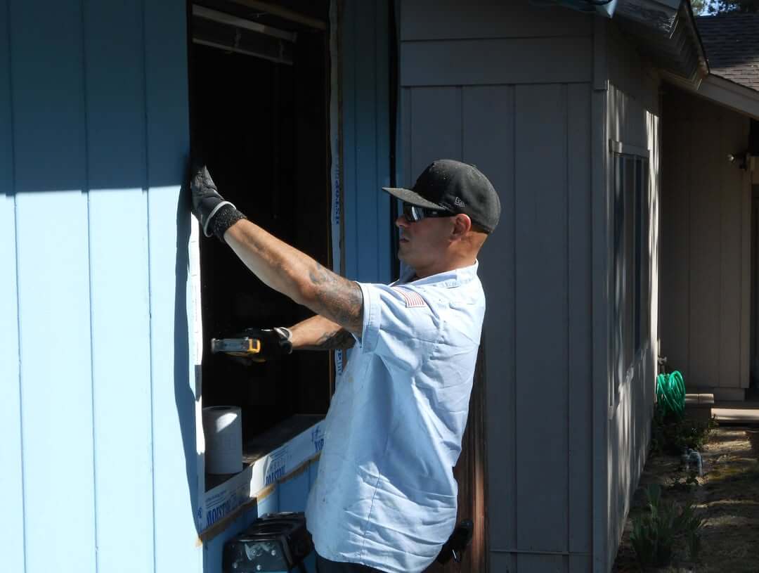 Clarke & Rush professional replacing old window with new