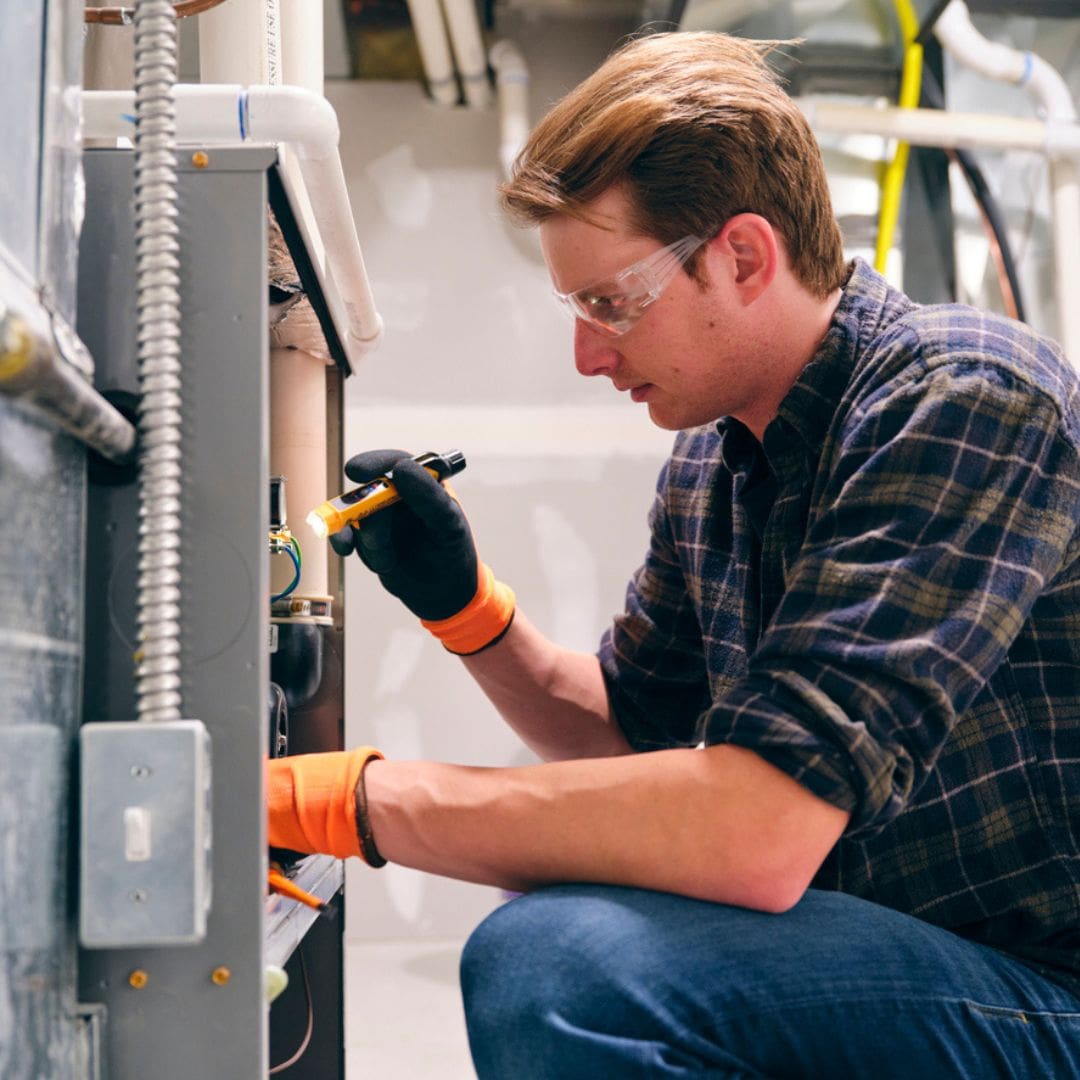 man working on hybrid hvac